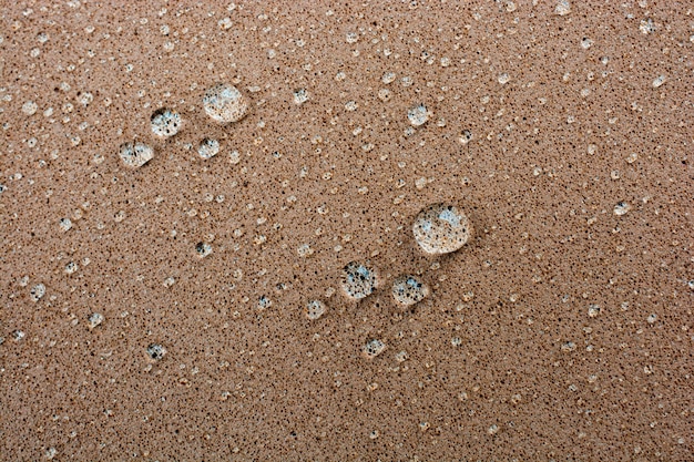 Achtergrond bedekt met waterdruppels in close-up