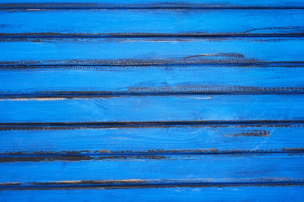 Achtergrond gemaakt van hout, geschilderd in blauw