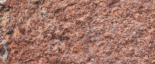 Achtergrond graniet met kleine zwarte en witte vlekken op het gehele oppervlak