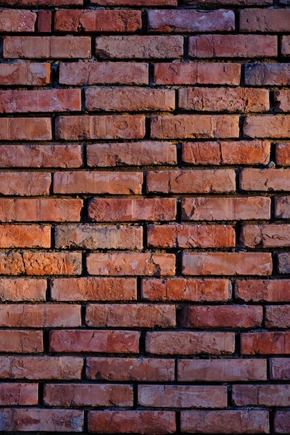 Achtergrond is muur oude rode verbrande baksteen