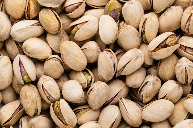 Achtergrond maken van verse zoute pistachenoten.