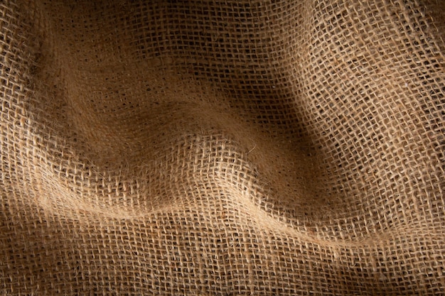 Foto achtergrond met beige jute vezeltextuur.