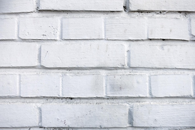 Foto achtergrond met de textuur van een bakstenen witte muur