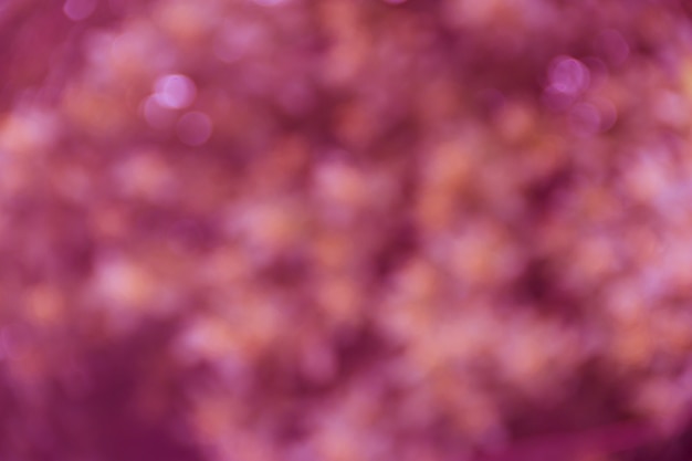 Achtergrond met looftextuur onscherp in de kleuren roze
