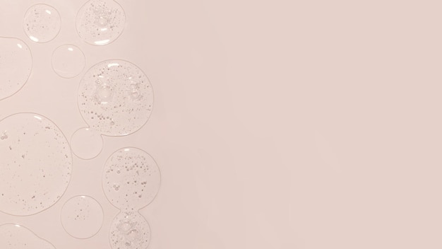 Achtergrond van cosmetische geldruppels met bubblespastel colorTLarge banner