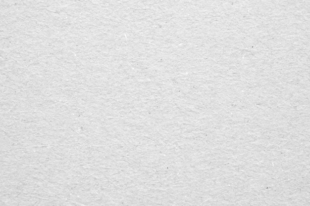 Achtergrond van de textuur van het oppervlak van wit recyclepapier en karton