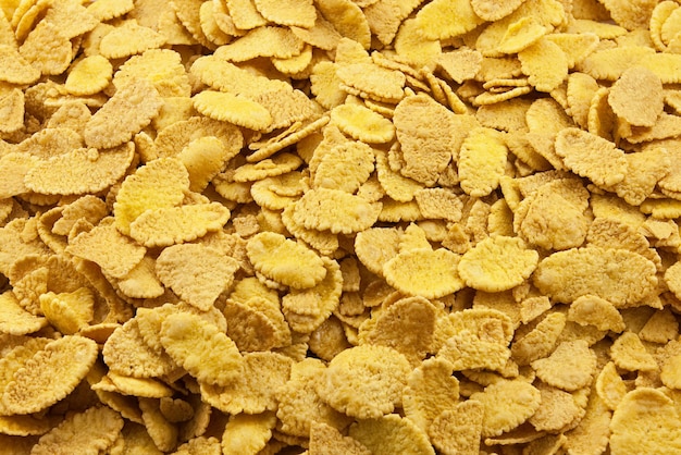 Achtergrond van droge gele zoete cornflakes