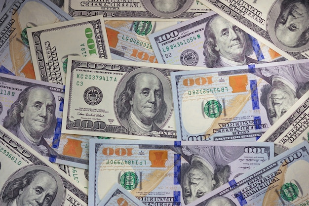 Achtergrond van een moderne 100 dollarbiljetten. Stapel honderd dollar achtergrond met kopie ruimte