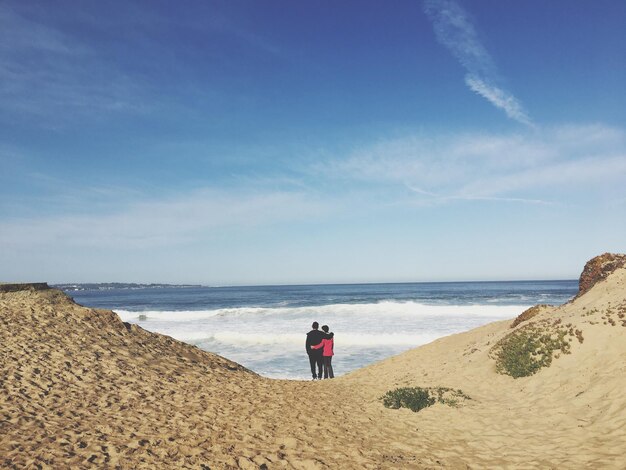 Foto achtergrond van een vrouw op het strand