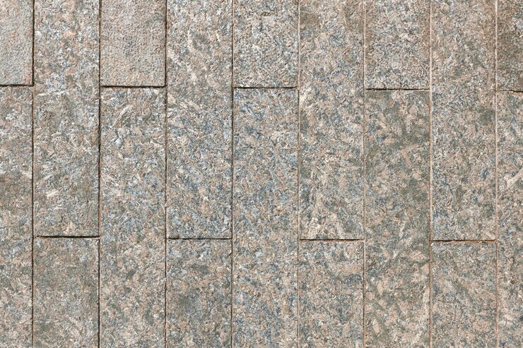 Achtergrond van getextureerde stenen bestrating tegels close-up