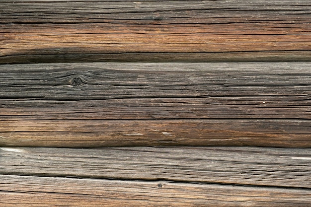 Achtergrond van houten horizontale oude logboeken met natuurlijke kleur