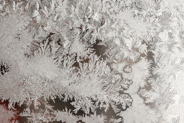 Foto achtergrond van natuurlijk bevroren glas, vensterglas met een mooi patroon