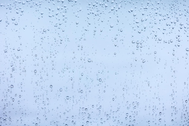 Achtergrond van regendruppels op glas