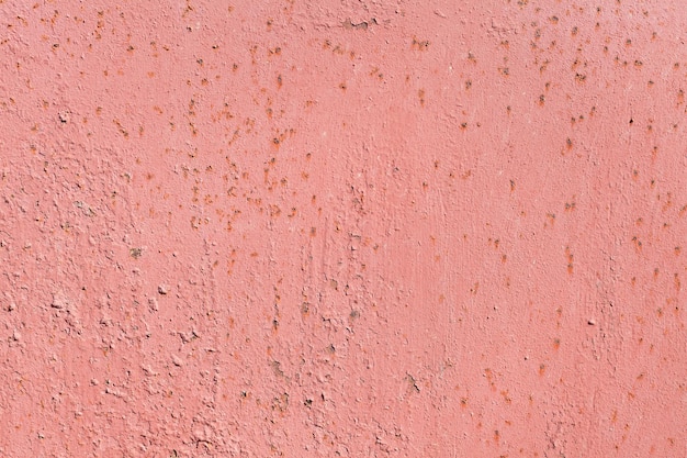 Achtergrond van roze geschilderde metalen muur