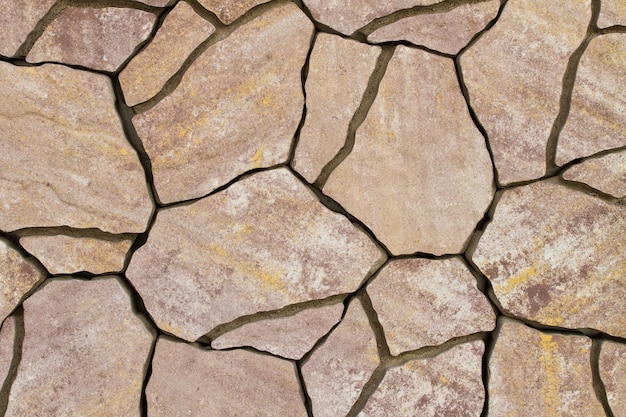 Achtergrond van straatstenen onregelmatige natuursteen