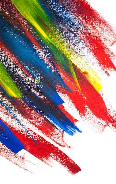 Achtergrond van verschillende lijnen van rode, gele, groene en blauwe verf met penseel op witte achtergrond close-up. Heldere kleurrijke achtergrond van penseellijnen. Kleur strepen verf mengen op wit canvas