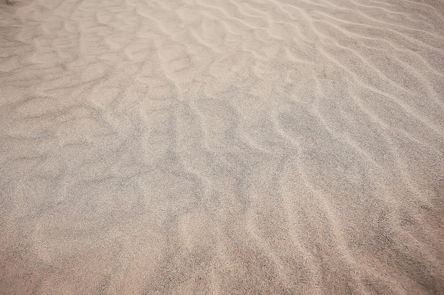 achtergrond zand woestijn / abstracte lege achtergrond, textuur woestijnzand, golven aan, zandduinen