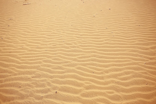 achtergrond zand woestijn / abstracte lege achtergrond, textuur woestijnzand, golven aan, zandduinen