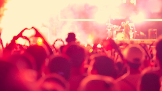 Foto achtergrondbeeld van mensen op een concert's nachts