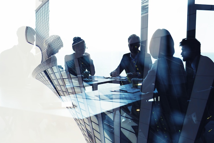 Foto achtergrondconcept met zakenmensensilhouet op het werk