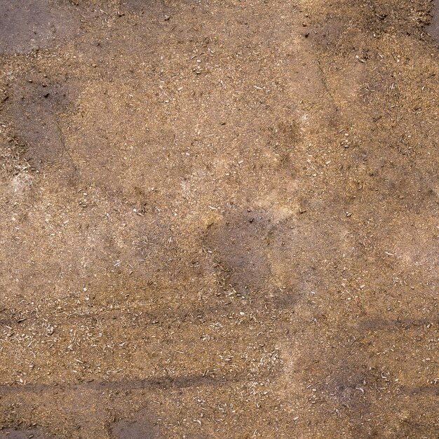 achtergrondstructuur van houtsnippers vanuit de lucht, bovenaanzicht en close-up van houtsnippers op de grond