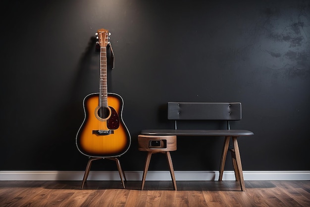 Acoustic guitar on a chair in black wall