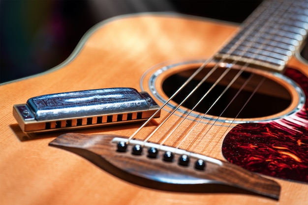 Acoustic guitar with blues harmonica country