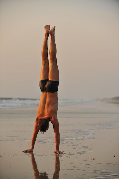 Acrobat on the seashore.