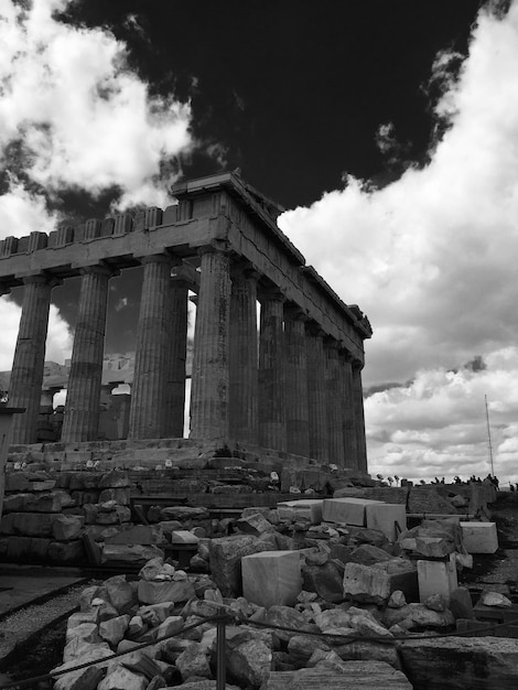acropolis of athens against cloudy sky