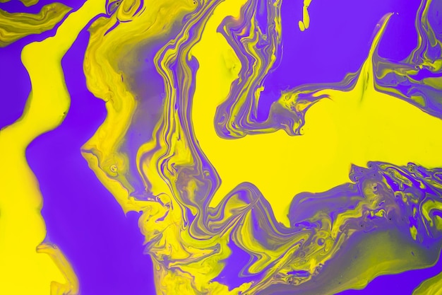 Acrylic Fluid Art. Glowing purple waves and yellow spots. Abstract marble background or texture.