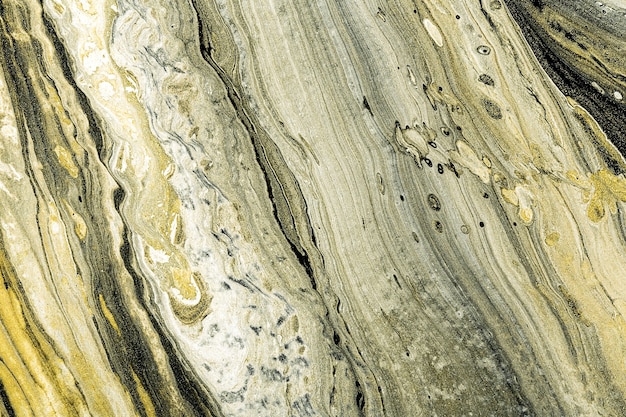 アクリル液アート。液体の黒、白、金の大理石のテクスチャ