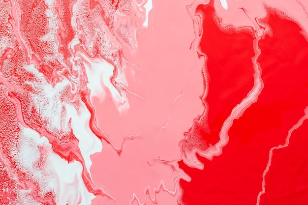 Acrylic Fluid Art. Pink and red waves and whites inclusion. Abstract marble background or texture.