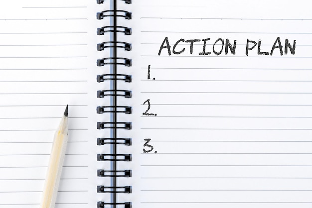 Action Plan list on notepad with pencil