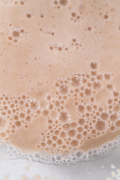 Activating an instant yeast in a glass mixing bowl.