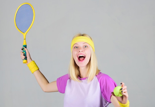 Active leisure and hobby girl fit slim blonde play tennis sport\
for maintaining health active lifestyle woman hold tennis racket in\
hand tennis club concept tennis sport and entertainment