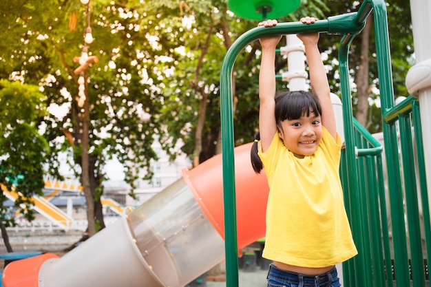 Active little girl on playground