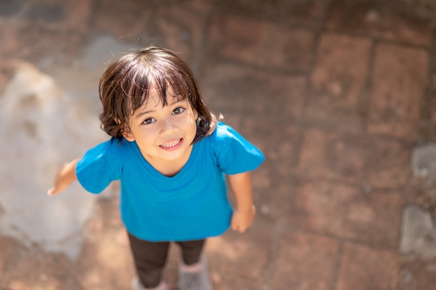 Active little girl on playground