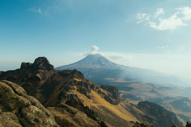 The active Popocatepetl volcano in Mexico as seen from Iztaccihuatl volcano