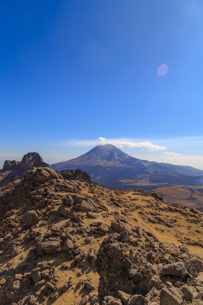 The active Popocatepetl volcano in Mexico as seen from Iztaccihuatl volcano