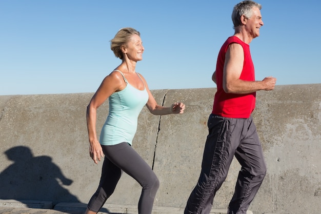 Active senior couple out for a jog