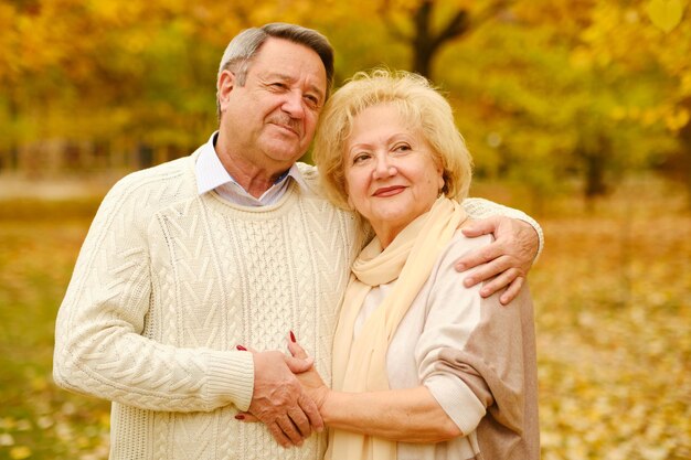 Active seniors on a walk in forest