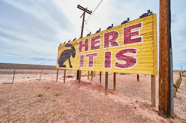 Ad for Jack Rabbit Trading Post on Route 66 that reads Here It Is