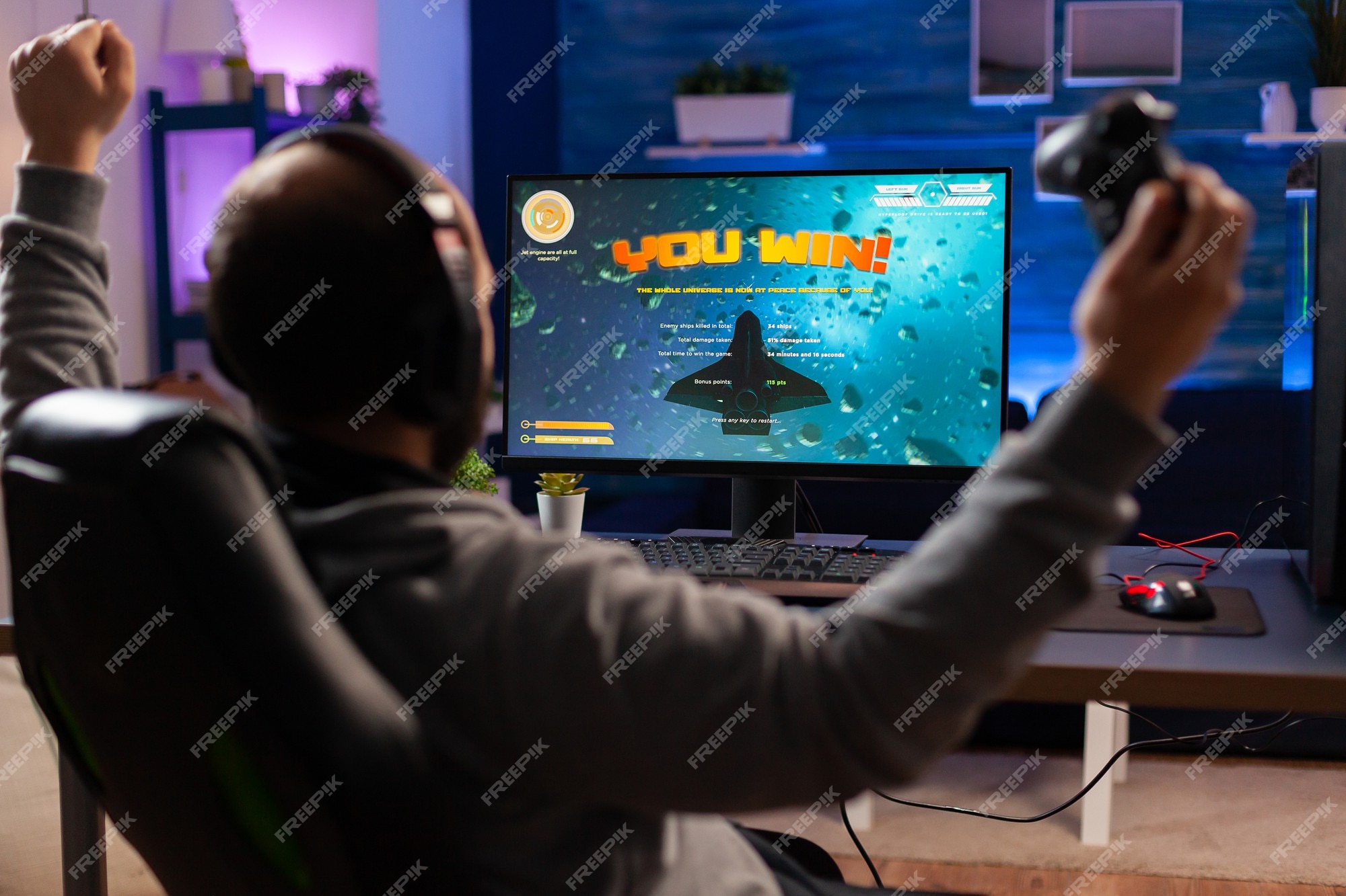 Premium Photo Excited player winning an important virtual egame competition of space shooter video game playing on powerful computer