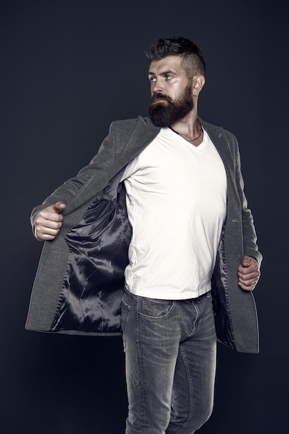 Adding fashionable touch Fashionable man grey background Fashionable look of vogue model Bearded man wear fashionable casual outfit Fashion and style trends vintage filter