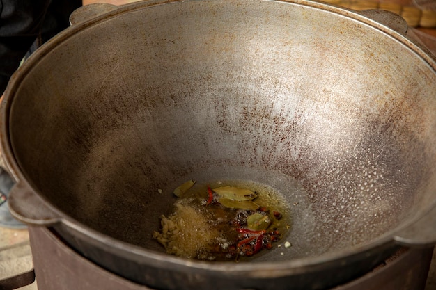 Adding garlic in the hot pot