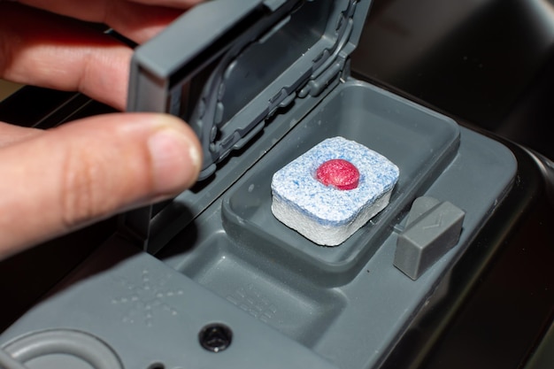 Adding a Powder Tablet in the Dishwasher