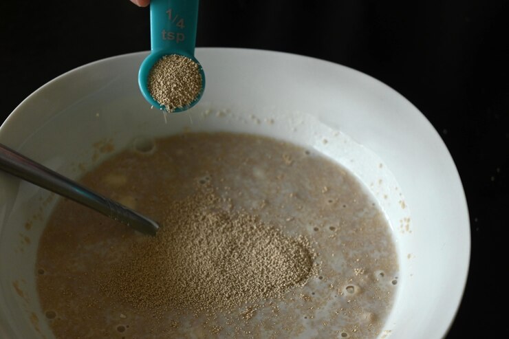 Addition of dry yeast to preferment plate