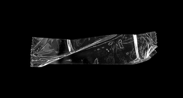 黒の背景に分離された粘着ビニール テープ