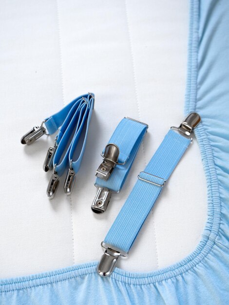 Photo adjustable elastic sheet clip blue with clips sheet with elastic bands 4 pieces