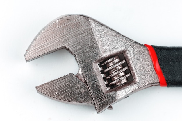 Adjustable wrench close-up. Metal hand tools.